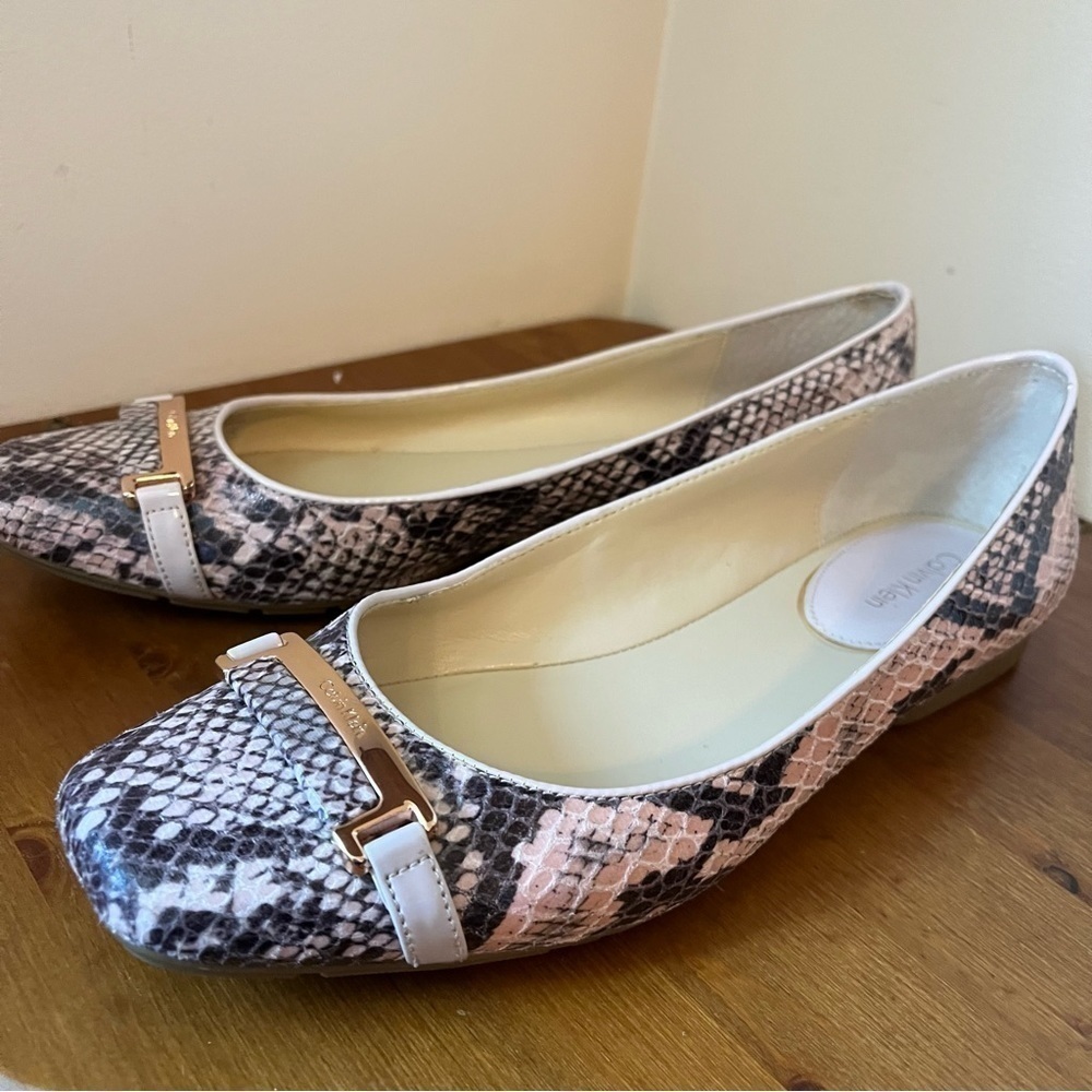 Calvin Klein pink grey ballet flats .  Light pink snakeskin .